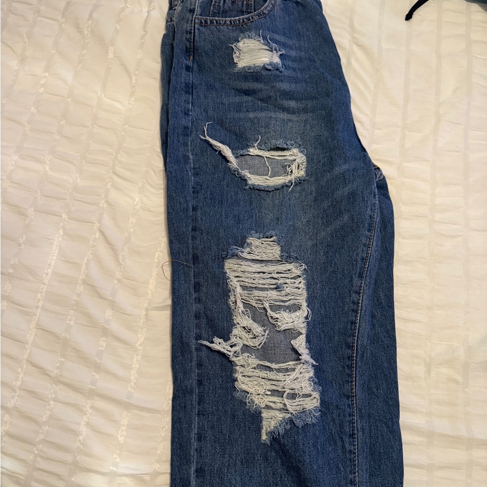 Distressed Blue Jeans